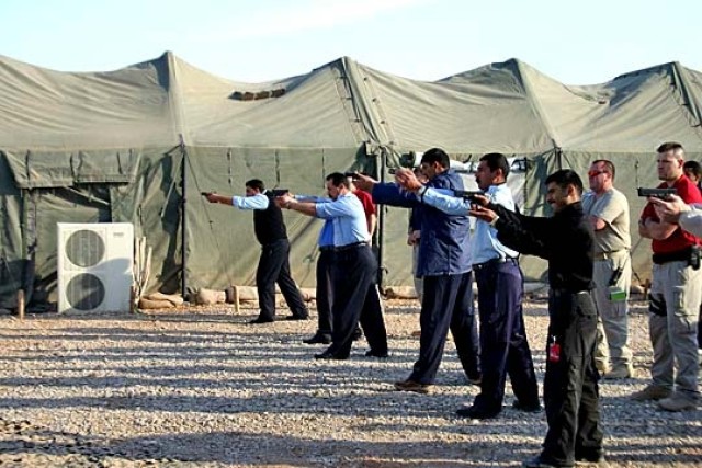 Iraqi Police Train to Lead, Protect