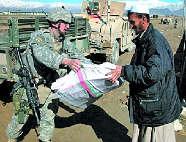 Soldiers Provide Supplies for Women's Day