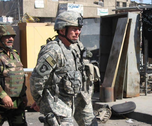 Petraeus Troops the Lines