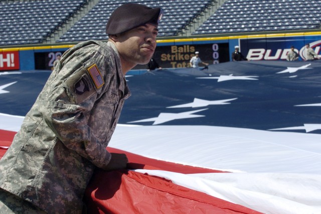 Soldiers Participate in Opening Day Ceremonies