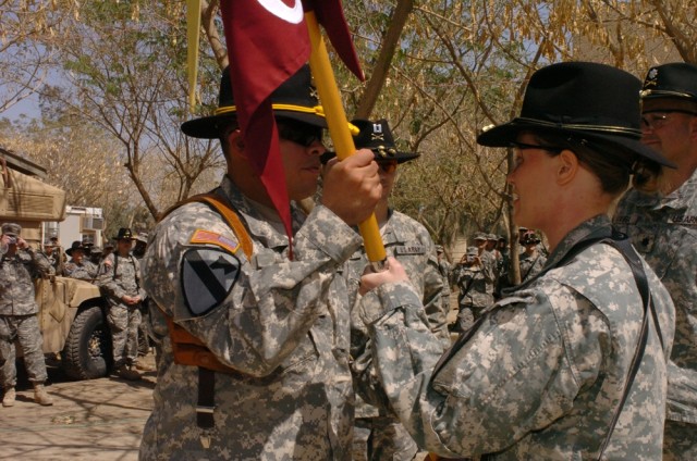 Change of command brings about role reversal for commanding couple