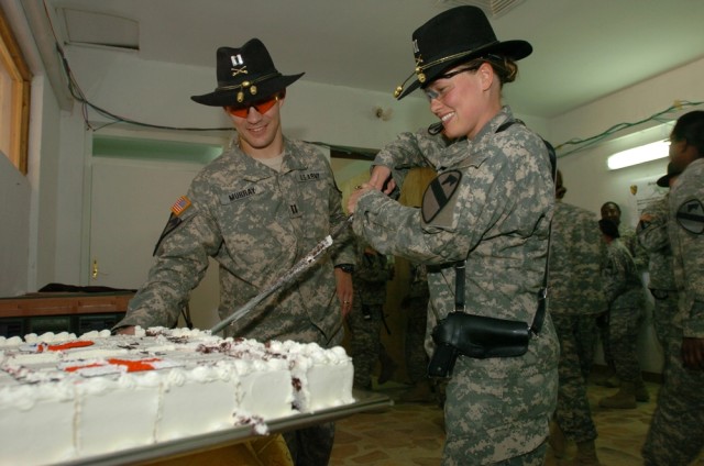 Change of command brings about role reversal for commanding couple