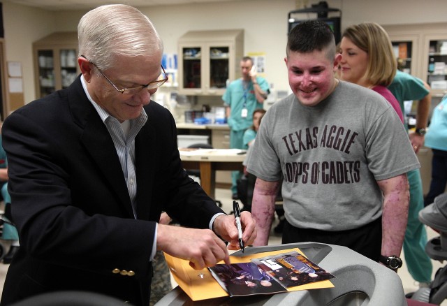 Gates visits wounded