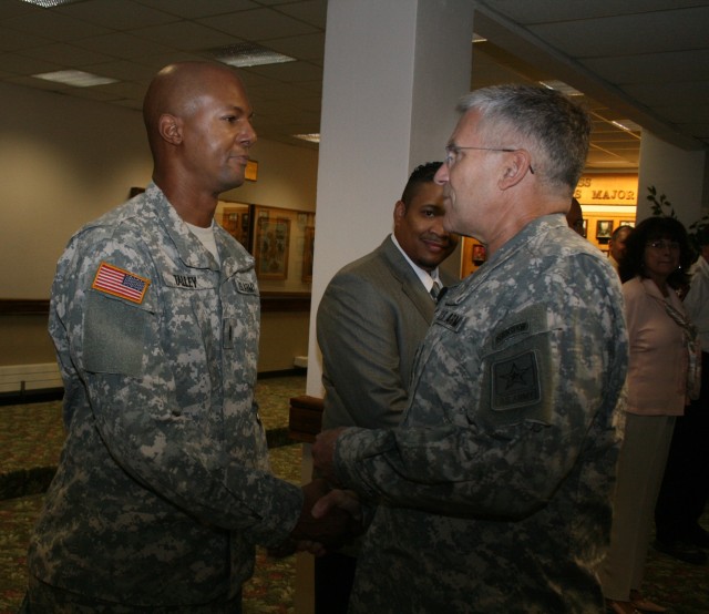 Gen. Casey Presents coins to mil &amp; civ