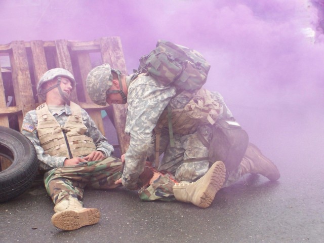 Pfc. Mutschler performs care under fire at EFMB