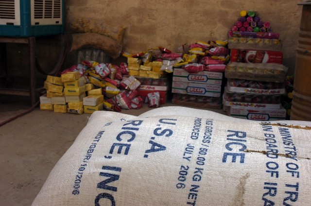 Several hundred pounds of rice, beans, crackers and canned vegetables were dropped off to a home for mentally disabled children during a humanitarian aid food drop coordinated by troops from Battery A, 3rd "Red Dragon" Battalion, 82nd Field...