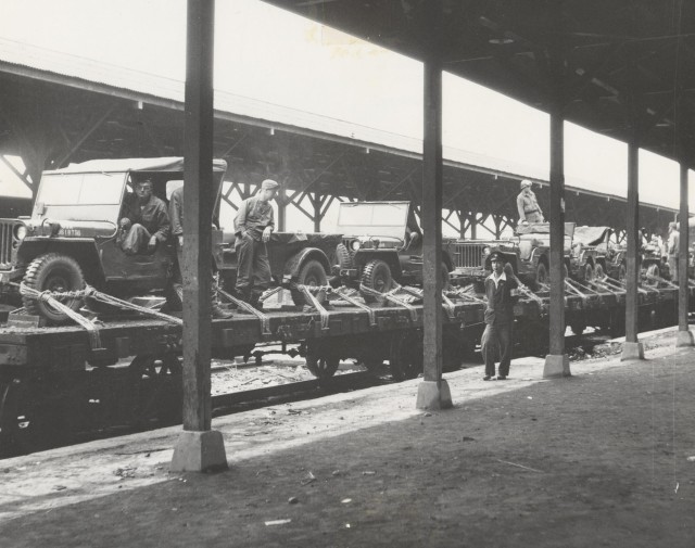 The Army Keeps Rolling Along ... By Train