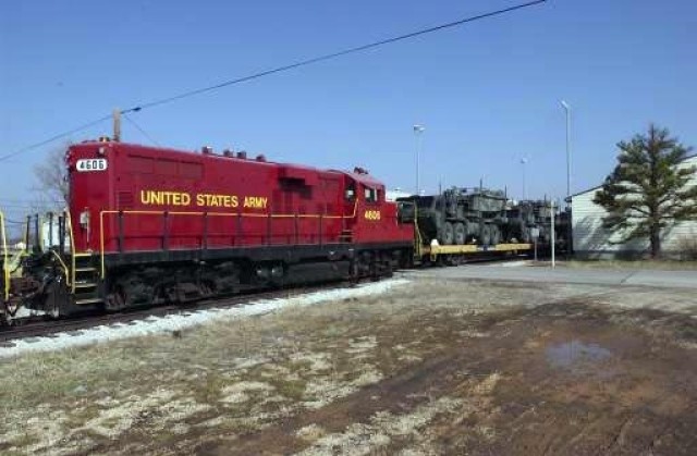 The Army Keeps Rolling Along ... By Train