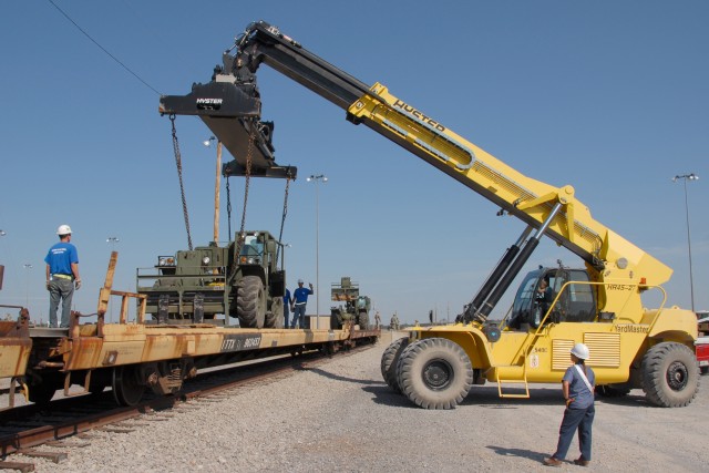 The Army Keeps Rolling Along ... By Train