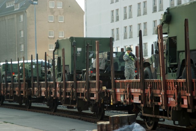 The Army Keeps Rolling Along ... By Train