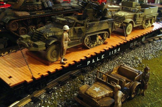 The Army Keeps Rolling Along ... By Train