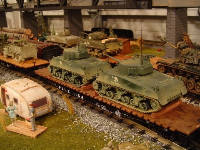 The Army Keeps Rolling Along ... By Train