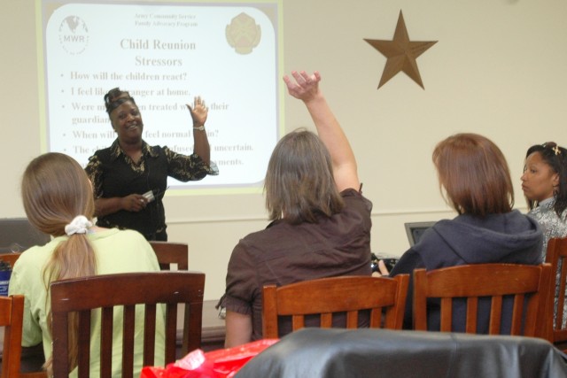 Mary Prater, a representative for the Family Advocacy Program, discusses techniques on how to slowly reintegrate spouses back into daily life at home during a Reunion and Reintegration Training held Oct. 25 at the Oveta Culp Hobby Soldier and Family ...