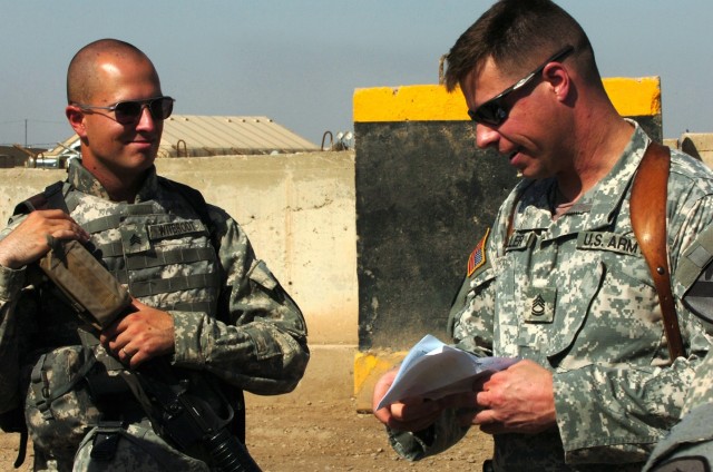 Orchard Park, N.Y., native, Sgt. 1st Class Jon Spiller (right), a flight medic for Company C, 2nd "Lobo" Battalion, 227th Aviation Regiment, 1st Air Cavalry Brigade, 1st Cavalry Division, and Bay City, Mich., native, Sgt. Robert Witbrodt (left), a UH...