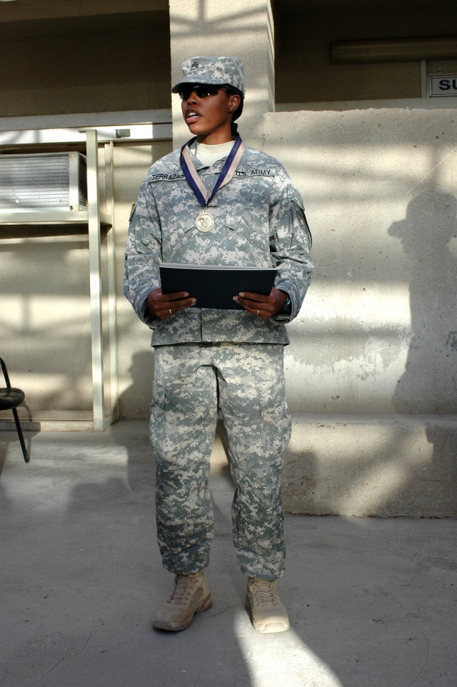 Cleveland native Sgt. 1st Class Cheryl Terrazas, the Area Defense Operations Center noncommissioned officer in charge for the 1st Air Cavalry "Warrior" Brigade, 1st Cavalry Division, speaks to those in attendance at an awards ceremony where she...