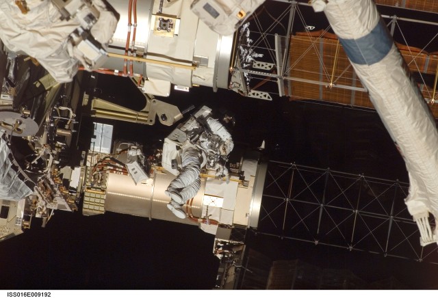 Astronauts Repair Panels During Spacewalk
