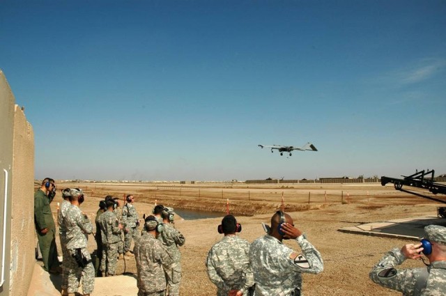 Portola Valley, Calif., native Maj. Gen. Joseph F. Fil Jr., the commanding general of the 1st Cavalry Division and Multi-National Division-Baghdad, (center-left, with controller) launches an unmanned aerial vehicle at the 1st Air Cavalry Brigade's UA...