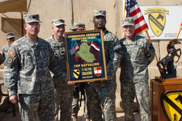 From left to right: Omaha, Neb. native Command Sgt. Maj. Mike Giles, command sergeant major for the 1st Battalion, 82nd Field Artillery Regiment; Lt. Col. Martin Clausen, the 1-82 FA Regt. commander who hails from San Diego and Mechanicsville, Md....