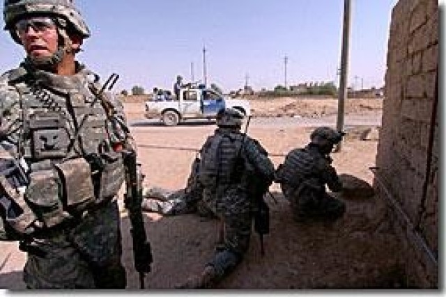 Combined forces fight to secure Iraqi town