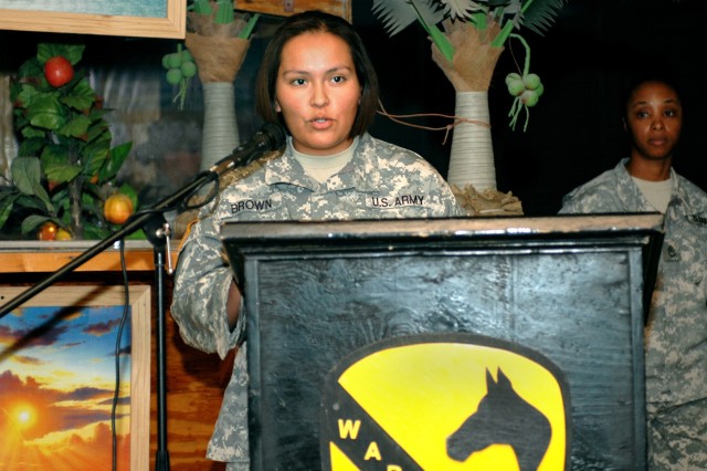 Torreon, N.M., native Sgt. Samantha Brown, the supply sergeant for Company C, 615th Aviation Support "Cold Steel" Battalion, 1st Air Cavalry Brigade, 1st Cavalry Division, speaks at the National American Indian Heritage Month ceremony held at Camp...