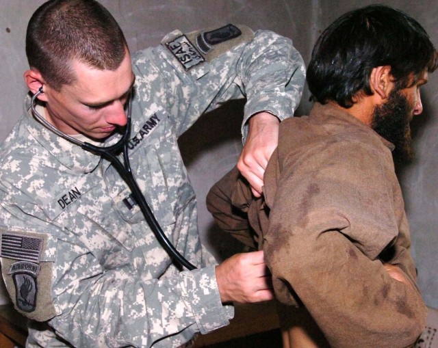Soldiers Provide Medical Assistance