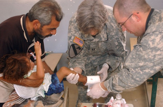 Soldiers Provide Medical Assistance