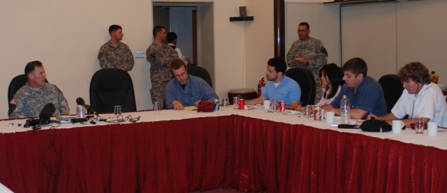 Portola Valley, Cal. native, Maj. Gen. Joseph F. Fil Jr.(far left), Multi-National Division - Baghdad and 1st Cavalry Division commanding general, speaks with reporters during a luncheon at Freedom Rest, a rest and recuperative center for Soldiers...