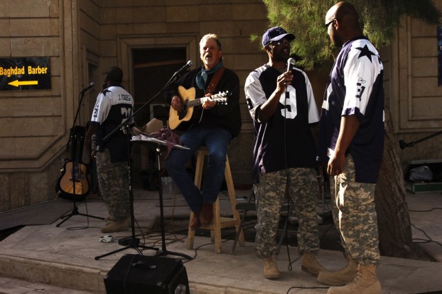 Staff Sgt. Jammie Blunt (center) and Pfc. Alphonso Izzard (right), perform with "The Singing Cowboy," Freddie Fuller, during a show for Soldiers of the 2nd Brigade Combat Team, 1st Cavalry Division at Forward Operating Base Prosperity in central...