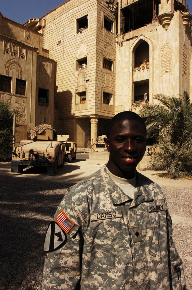 Spc. Emmanuel Danso, a supply clerk with Company E, 1st Battalion, 5th Cavalry Regiment, which is currently attached to the 4th Squadron, 9th Cavalry Regiment, 2nd Brigade Combat Team, 1st Cavalry Division, poses in front of the palace at Forward...