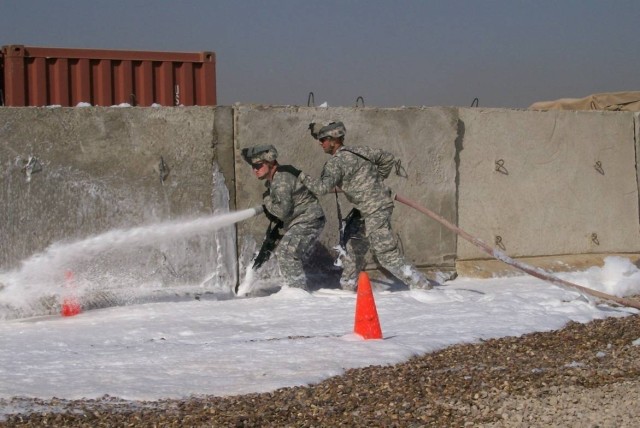 Combat Firefighters Train to Battle Camp Blazes