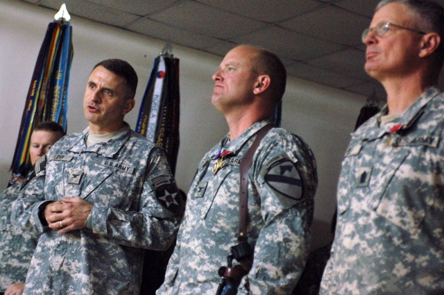 Col. John Lehr, commander of the 4th Stryker Brigade Combat Team, 2nd Infantry Division, and incoming commander of Diyala province, speaks during the Nov. 27 color casing ceremony for the outgoing 3rd Brigade Combat Team, 1st Cavalry Division, at...