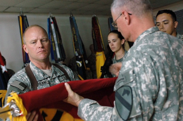 Col. David W. Sutherland and Command Sgt. Maj. Donald R. Felt, commander and command sergeant major of the 3rd Brigade Combat Team, 1st Cavalry Division, case the brigade colors during a ceremony at Forward Operating Base Warhorse in Baqouba,...