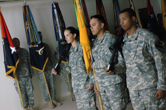 The color guard for the 3rd "Grey Wolf" Brigade Combat Team, 1st Cavalry Division, prepares to case the brigade colors at Forward Operating Base Warhorse in Baqouba, Iraq, Nov. 27 as the brigade completes its tour of duty in Diyala province. All...
