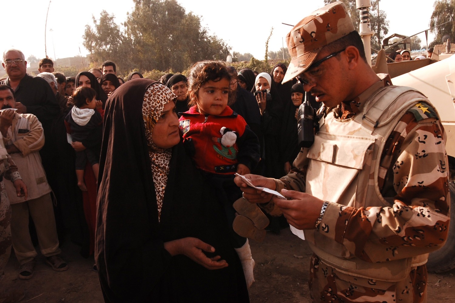 With colder weather on the way, troops distribute heaters in central ...