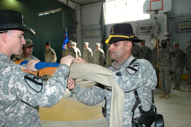 Bayamon, Puerto Rico, native Command Sgt. Maj. Ismael Medina Jr. (right), the senior noncommissioned officer for 1st "Attack" Battalion, 227th Aviation Regiment, 1st Air Cavalry Brigade, 1st Cavalry Division, and Las Vegas native Lt. Col....