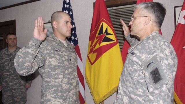 Gen. Casey re-enlists Spc. Garcia