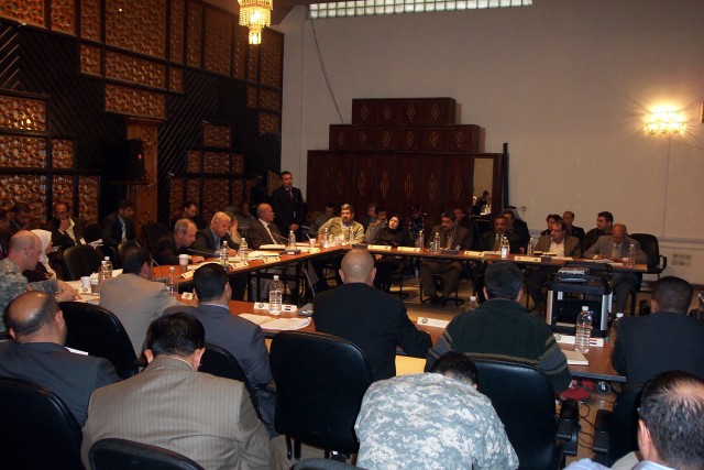 CAMP TAJI, Iraq -- Representatives from ministries in the government of Iraq as well as those from the Baghdad Provincial Government and Taji qada leaders among others hold the first meeting of the Taji qada's (a Baghdad rural district council)...