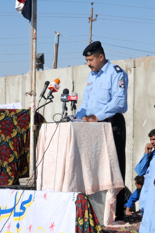 CAMP LIBERTY, Iraq - Iraqi Police Maj. Jasem Muhammed, the commanding officer of the Iraqi Police in the town of Aqur Quf, in the Abu Ghraib district near Baghdad, speaks at a ceremony outside the recently-built police station Dec. 12. The Iraqi Poli...