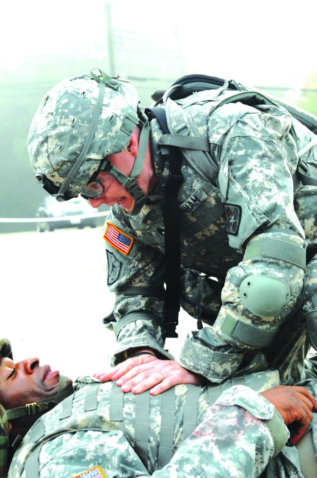 First aid during the Warrior Tasks and Battle Drills event.