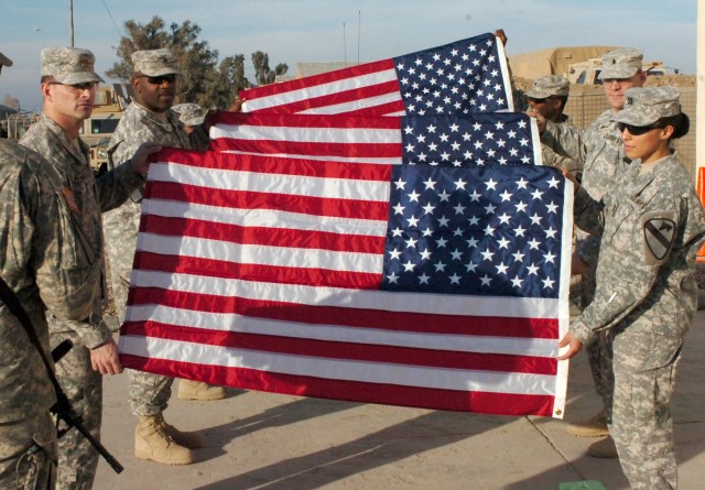 Ironhorse Brigade troopers unfurl gift flags during commemoration of ...