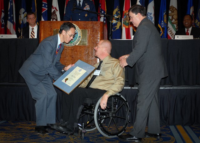 ASC employee earns disability award