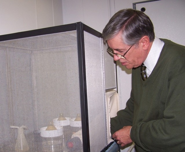 Dr. Ed Evans, CHPPM Entomological Sciences Program manager, with lab mosquitoes