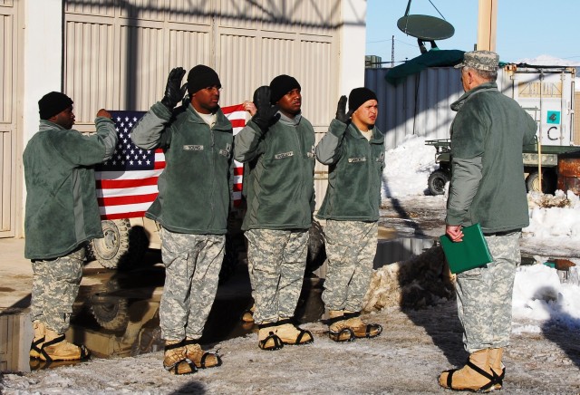 AMC CG visits FOBs in Afghanistan, reenlists 3 Soldiers