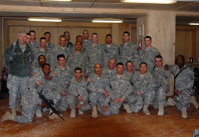AMC CG visits FOBs in Afghanistan, reenlists 3 Soldiers
