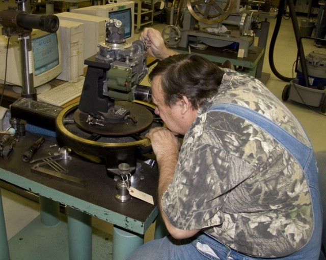 Optics repairers in tritium room seeing fewer radioactive sources