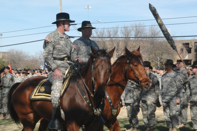 Gen. Charles C. Campbell (right) of Shreveport, La., commander of the U.S. Army Forces Command, and Portola Valley, Calif., native Maj. Gen. (P) Joseph F. Fil, Jr., outgoing commander of the 1st Cavalry Division inspect the troops during a...