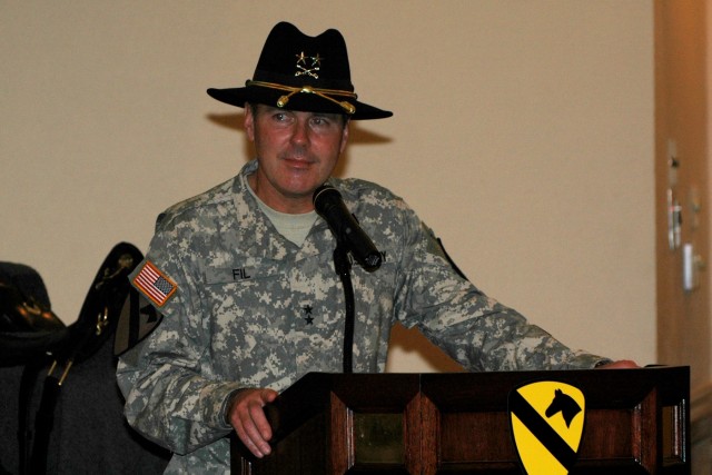 Maj. Gen. (P) Joseph F. Fil Jr., the commanding general of the 1st Cavalry Division, tears up while speaking to the Purple Heart recipients and volunteers during the 1st Cavalry Division Purple Heart and Volunteer of the Month Ceremony held Jan. 29 a...