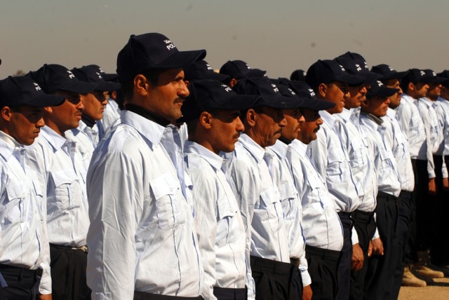 Police Graduates Stand in Formation