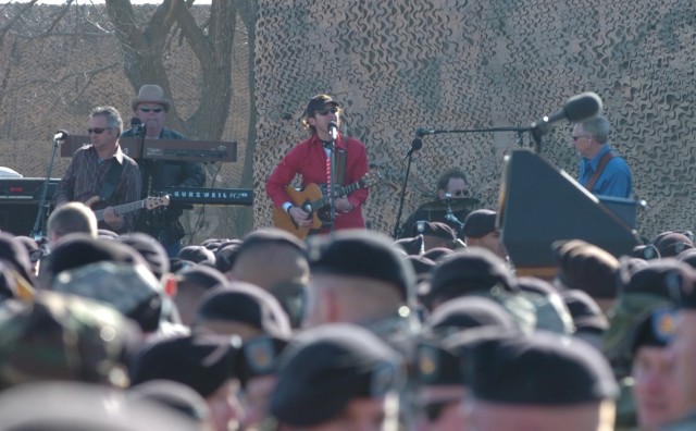 Granger Smith and his band perform for troops at a rally prior to Vice President Richard Cheney's speech on the 1st Cavalry Division's parade field on Fort Hood, Texas, Feb. 26. Smith took the opportunity to thank Soldiers for their service, since...