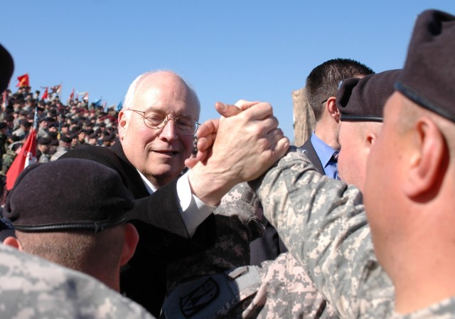 Joliet, Ill. native Sgt. Donald Davis, a transportation noncommissioned officer for Company A, 115th Brigade Support Battalion, shakes the hand of Richard Cheney, vice president of the United States, as he worked his way through the crowd of 9,000...